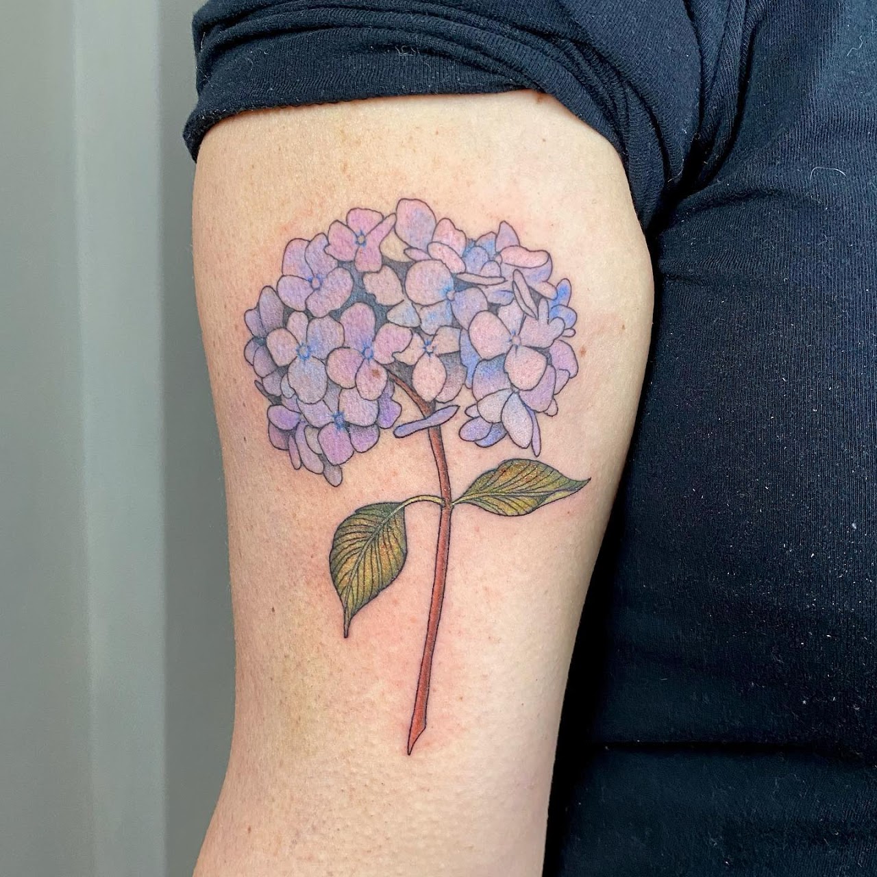 Tatuaje color Santiago